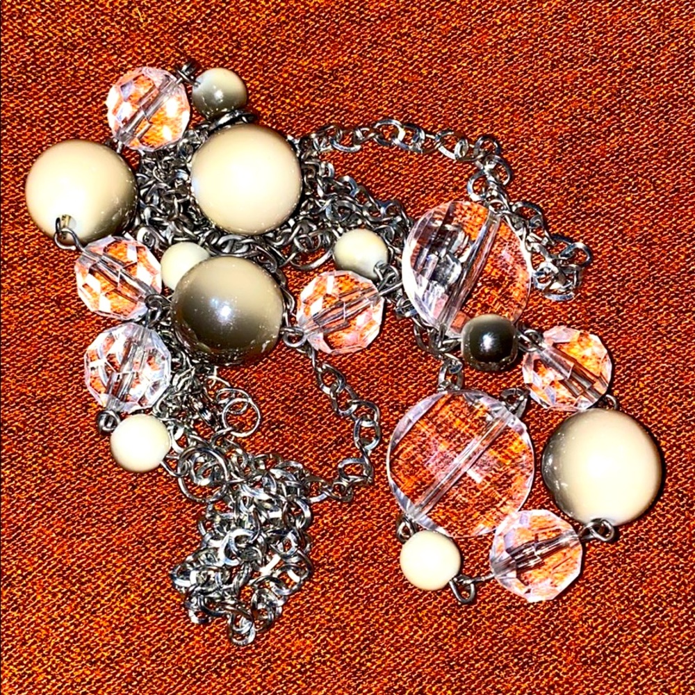 Triple strand silver and beaded necklace.